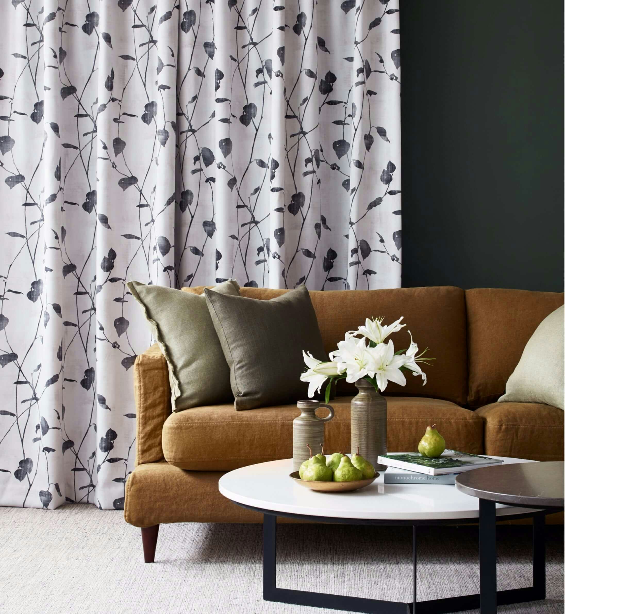 grey and white branch foliage leaf pattern curtains in contemporary lounge space on olive green walls