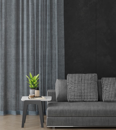 grey eco sheer curtains in modern lounge on black walls