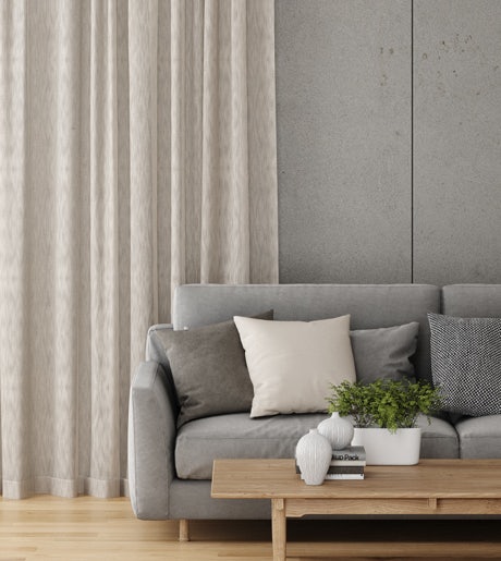 sandy beige eco curtains in modern lounge on grey walls