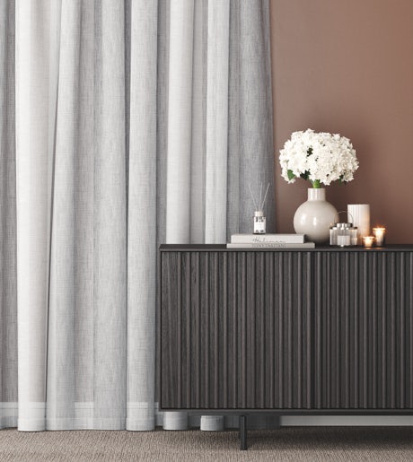 silver grey sheer curtains in contemporary room on brown walls