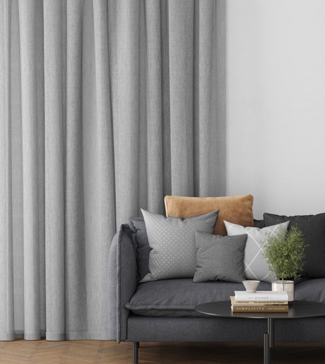light grey sheer curtains in modern lounge on white walls