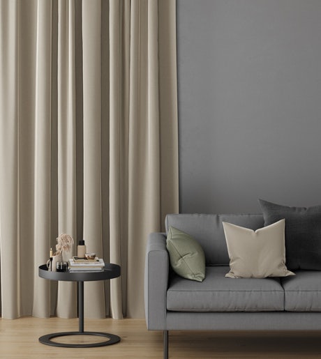 sandy brown curtains in modern lounge room on grey walls