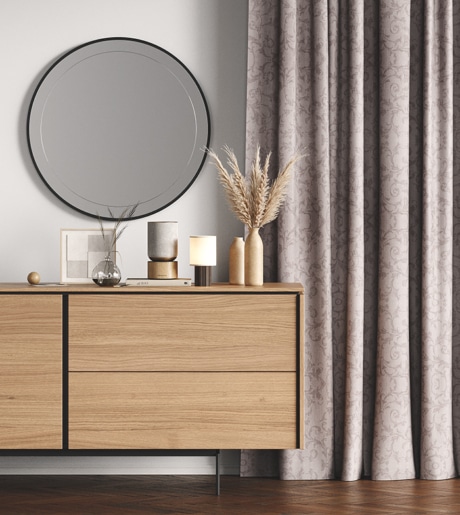 beige paisley pattern curtains in modern room on off white walls