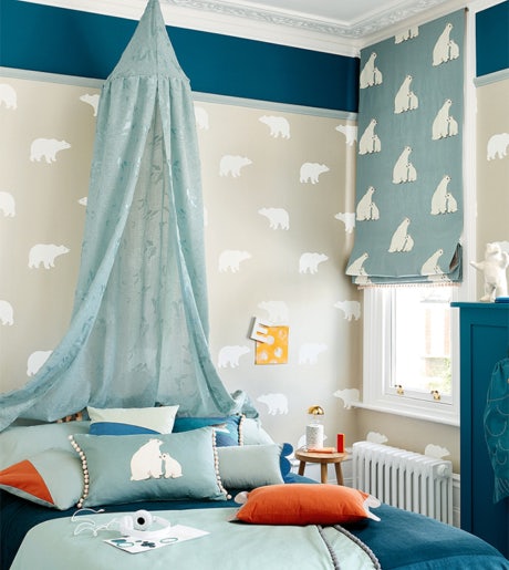 blue and white polar bear pattern roman blinds in modern childrens room on beige and white polar bear wallpaper walls