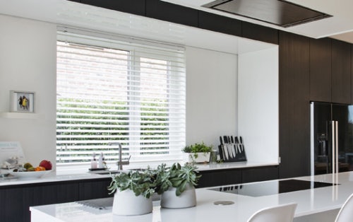 Kitchen with small window and Russells venetian blind woodstyle