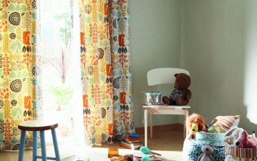Kids bedroom with curtain fabric hanging on window - Scion Melinki Woodland