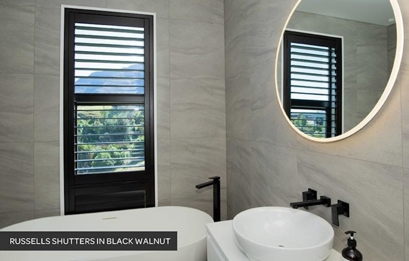 black timber shutters in modern bathroom on grey pattern tiles