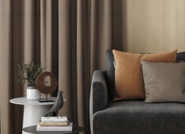 brown eco curtains in modern stylish lounge room on beige walls