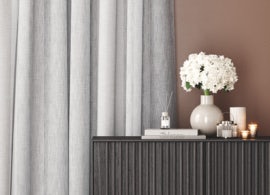 light grey curtains in contemporary simple room on brown walls