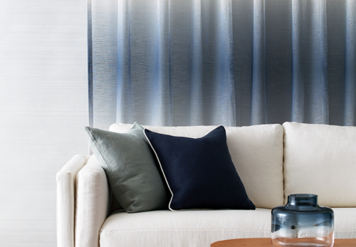 blue grey and navy tie dye sheer curtains in modern lounge room on white walls
