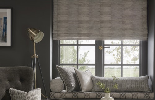 Lounge with chain, couch and window with Russells roman blinds
