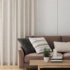 beige sheer eco curtains in modern lounge room on white walls