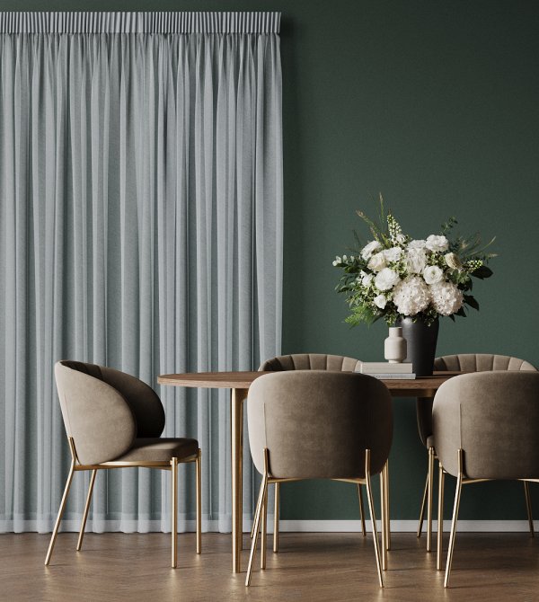 Grey striped pencil pleat curtains in a dining room with a green accent wall.