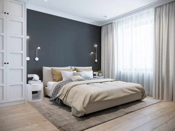 Grey-walled bedroom with light grey sheer curtains and a wooden wardrobe.
