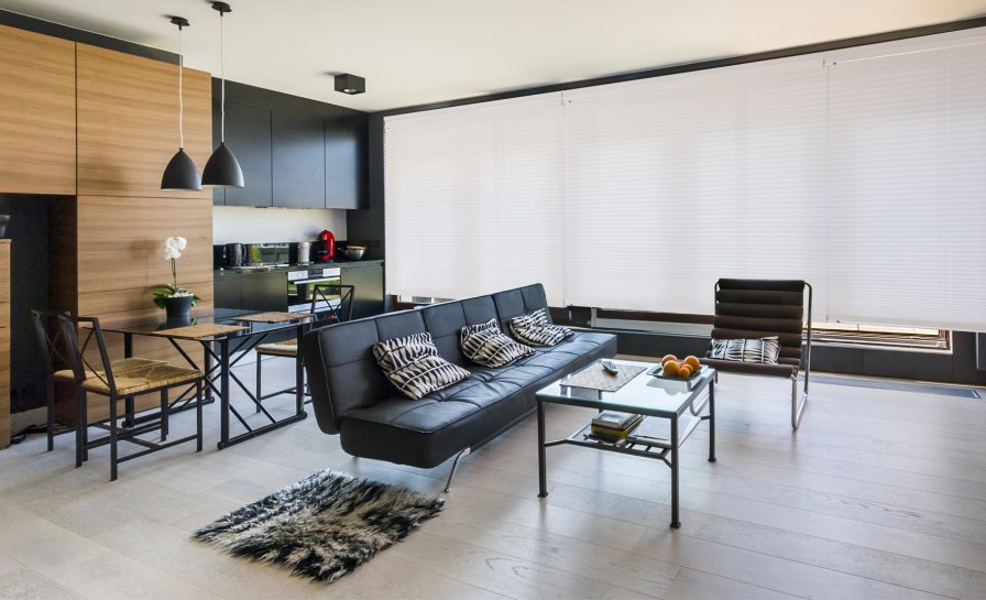 Custom-made light-filtering roller blind fitted neatly to a window