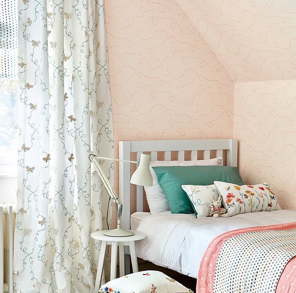 Whimsical illustrated curtain fabric for a children's nursery