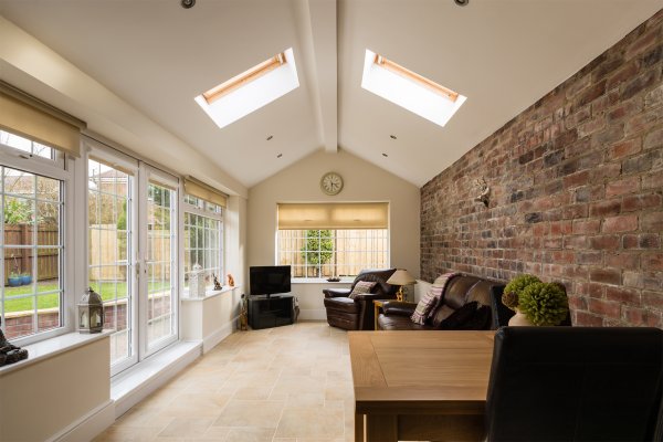 Sun-filled conservatory with large glass windows