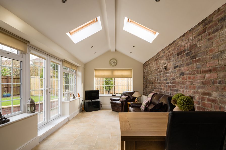 Sun-filled conservatory with large glass windows