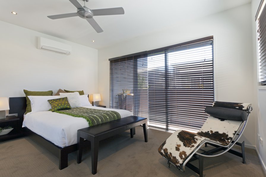 Apartment living space with blinds controlling light and privacy