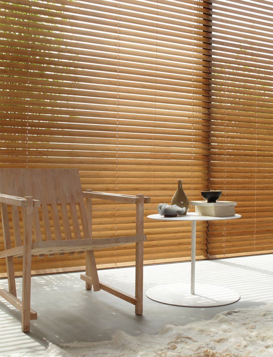 Timber venetian blinds in oak on a large window