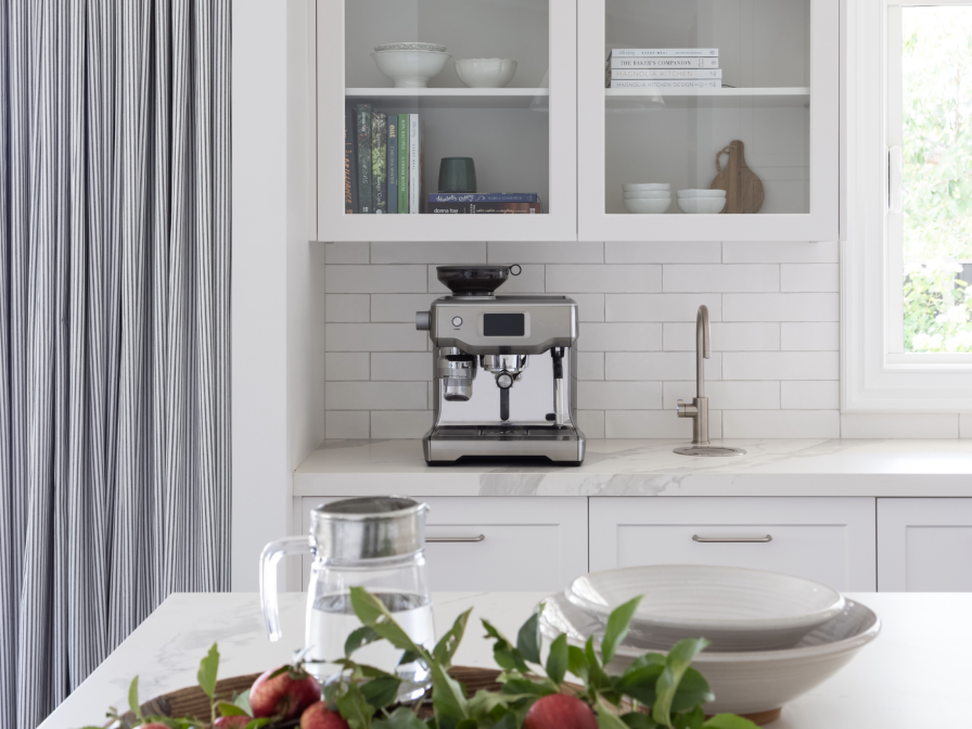 Curtains framing a kitchen window