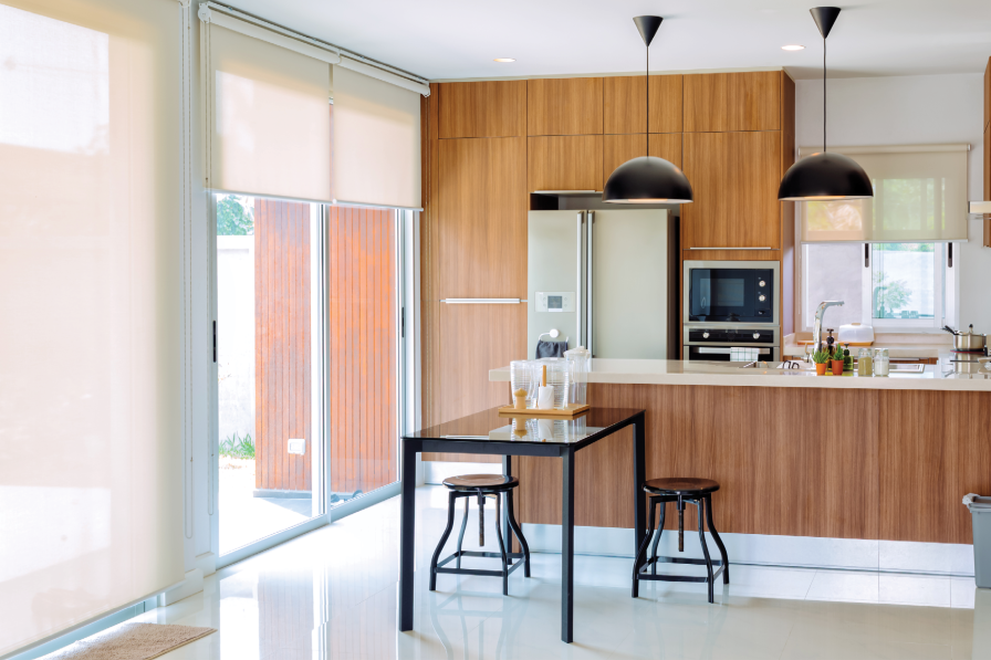 Roller blinds fitted in a kitchen window