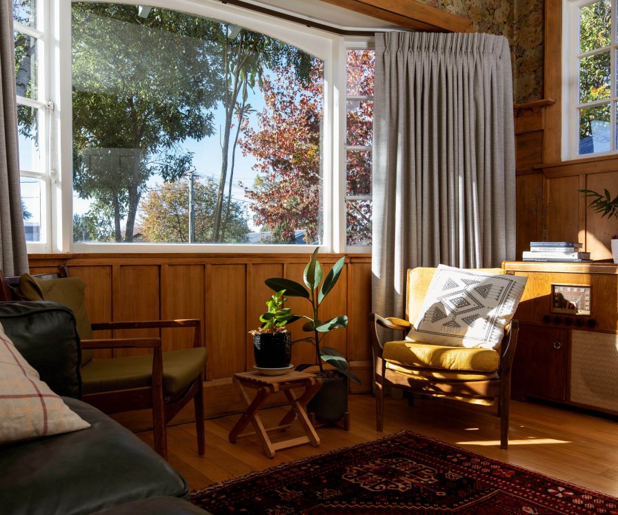 Earth-tone curtains in a relaxed living space