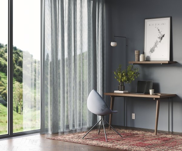 Floor to ceiling curtains drawing the eye up a high-ceilinged room
