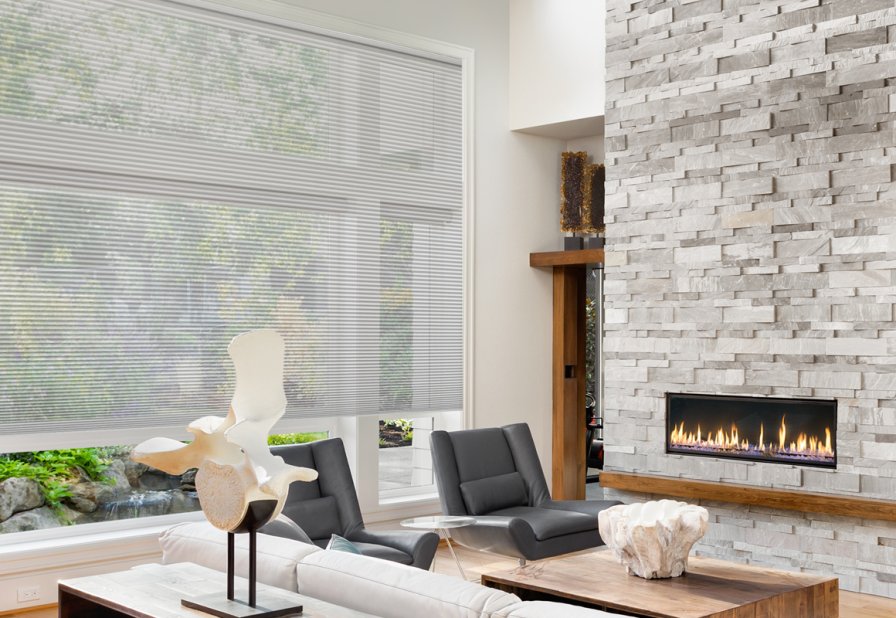 A bright living room styled with elegant window furnishings
