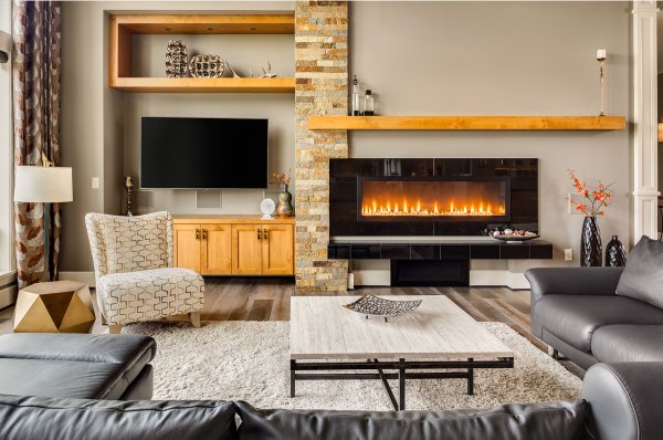 A cosy living room layered with throws and cushions for winter