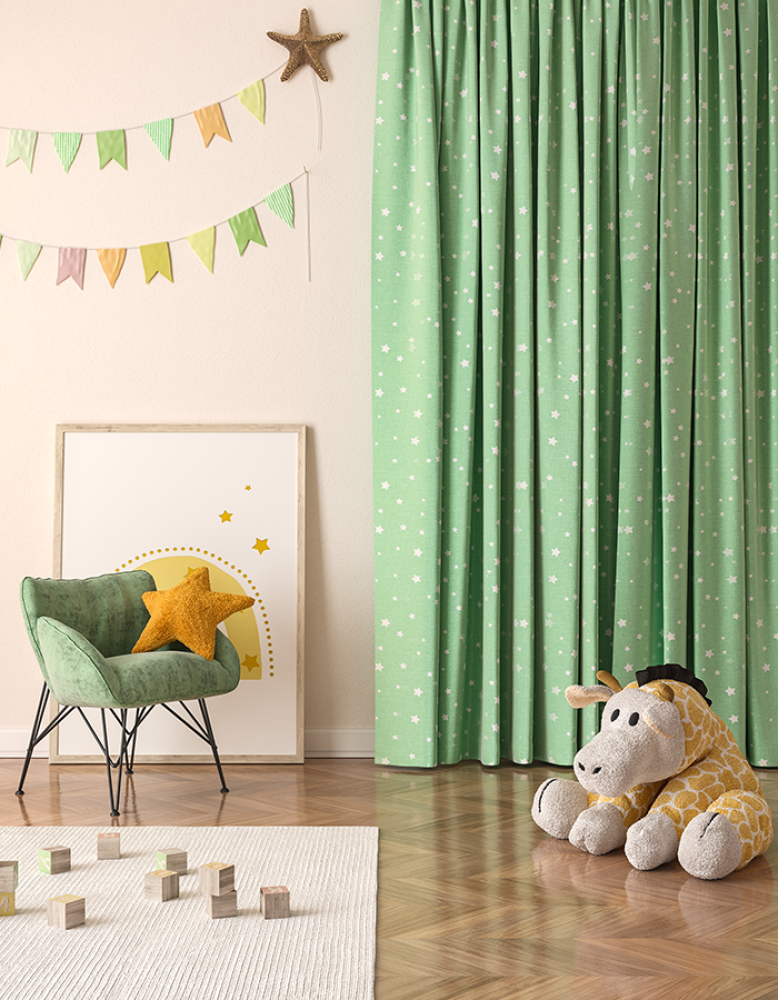 Sage green curtains with a white spot pattern in a child's bedroom with bunting and stars.
