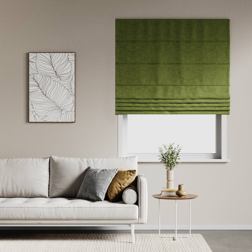 Artichoke-green roman blind above a bright living-room window.