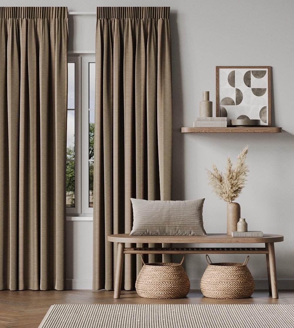 Taupe floor-to-ceiling linen curtains in a hallway with a wooden bench and woven baskets.