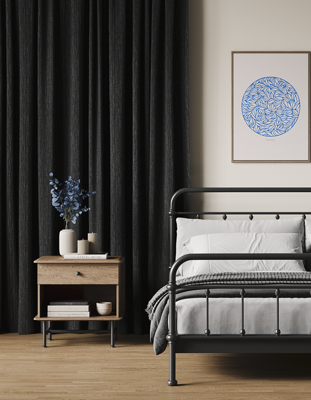 Charcoal-black curtains beside a bed with a white frame and bedding.
